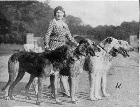 Patsy Rank with four hounds